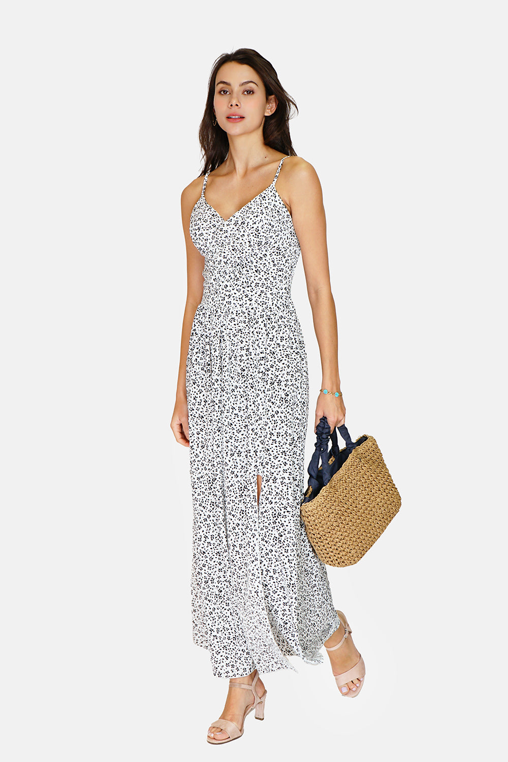 Long midi dress with thin straps, neckline and tie at the back