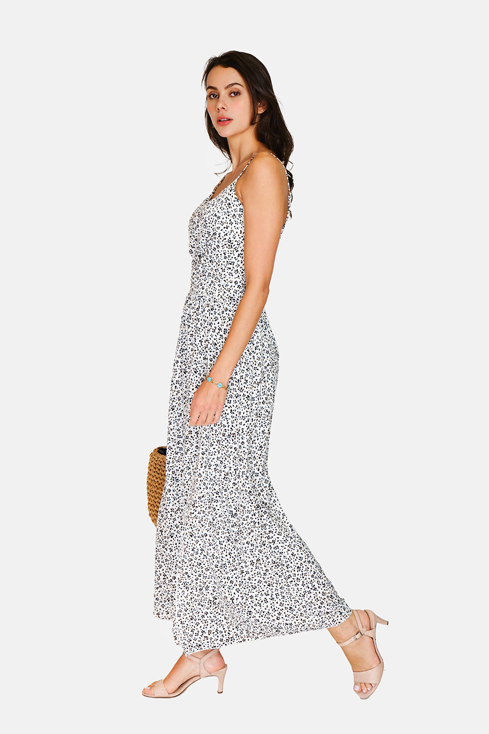 Long midi dress with thin straps, neckline and tie at the back