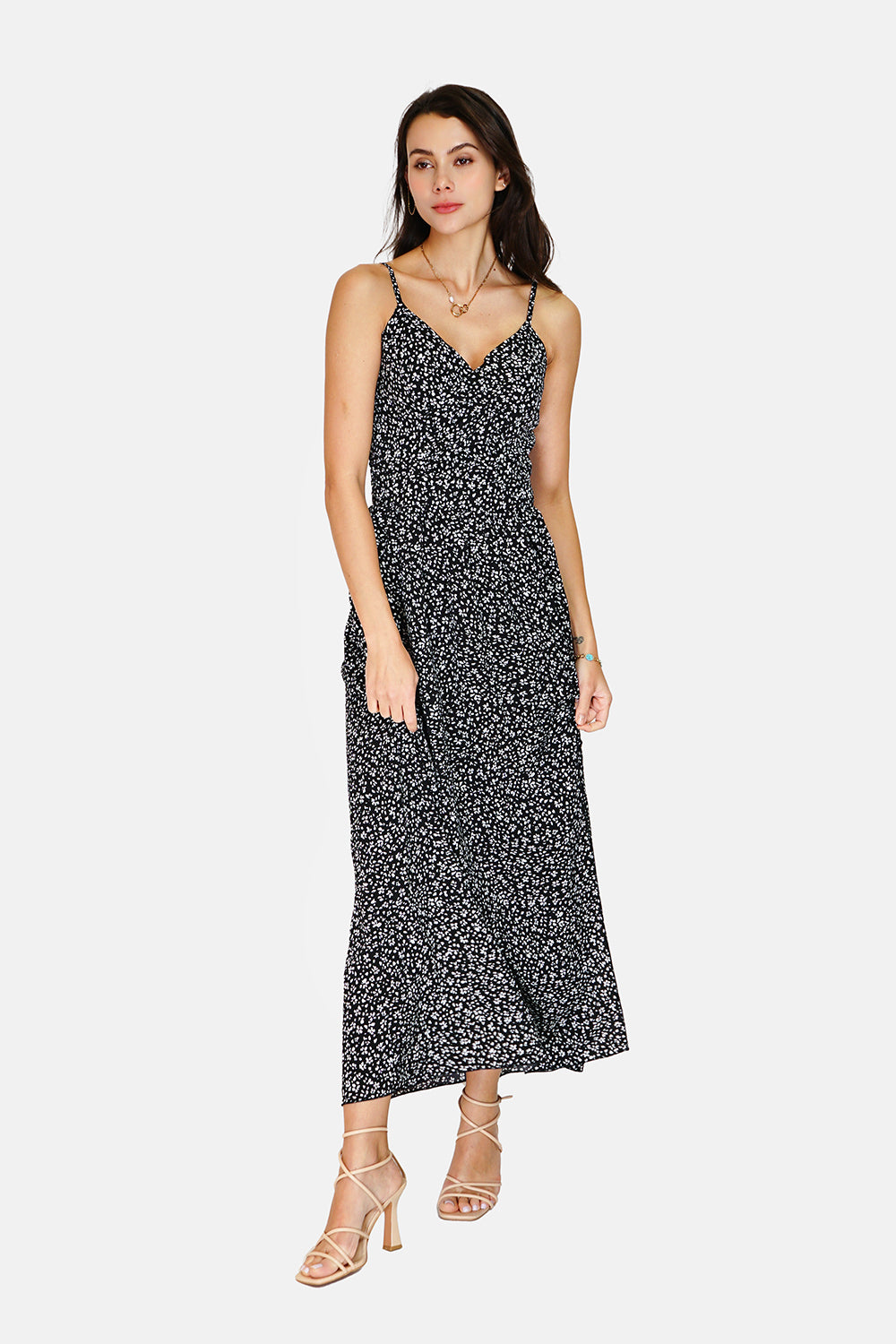 Long midi dress with thin straps, neckline and tie at the back