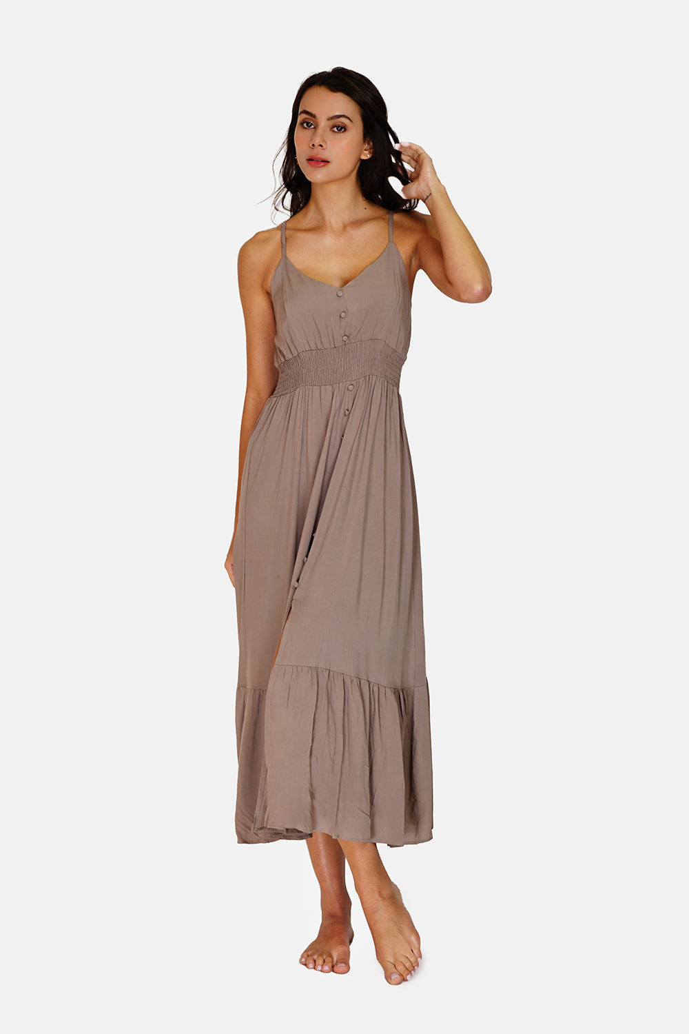 Dress with thin straps, neckline and tie at the back, lined