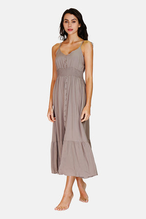 Dress with thin straps, neckline and tie at the back, lined