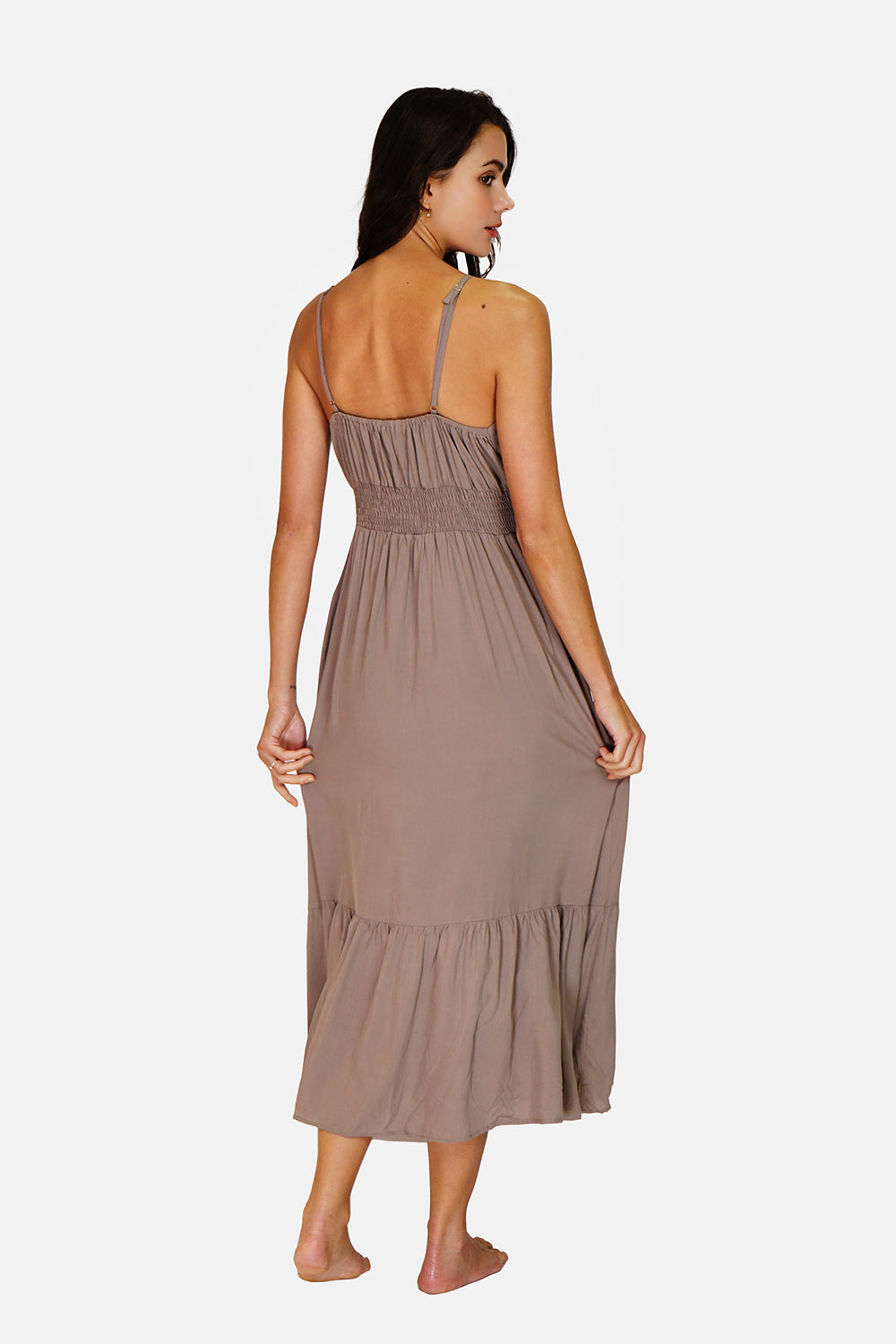 Dress with thin straps, neckline and tie at the back, lined