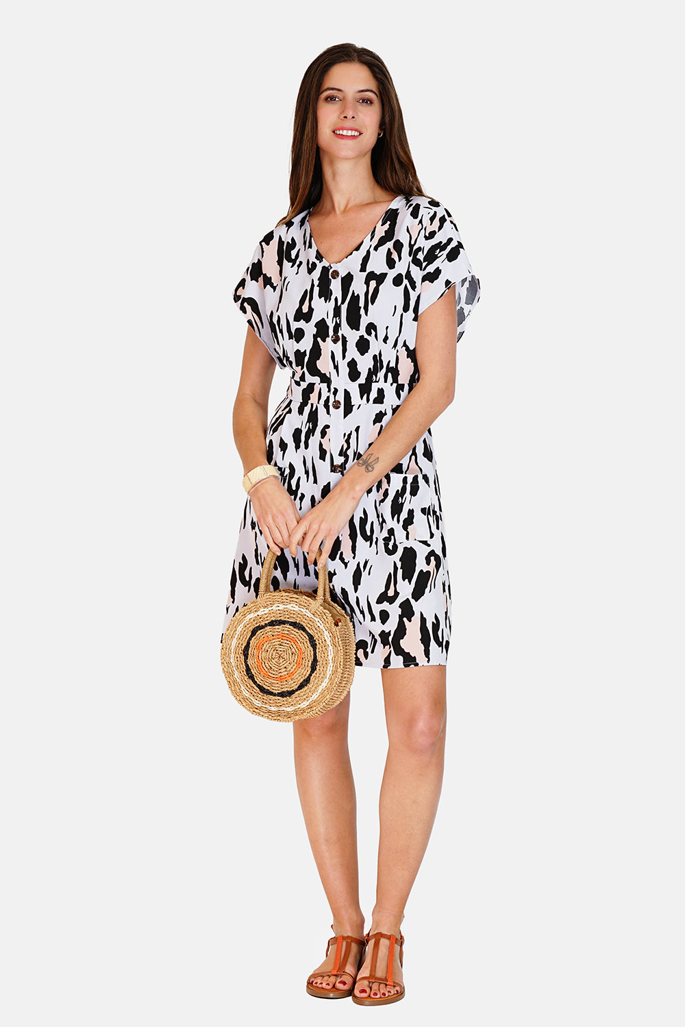 Buttoned dress with pockets in designer print with short sleeves