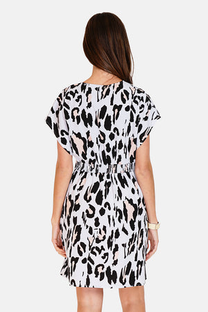 Buttoned dress with pockets in designer print with short sleeves