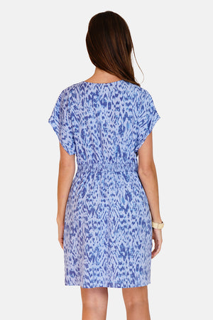 Buttoned dress with pockets in designer print with short sleeves