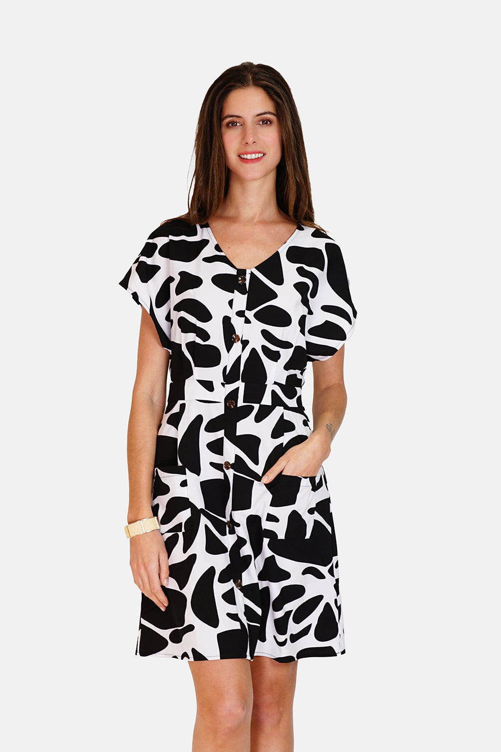 Buttoned dress with pockets in designer print with short sleeves