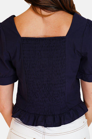 Top with square collar and buttoned front in 1950