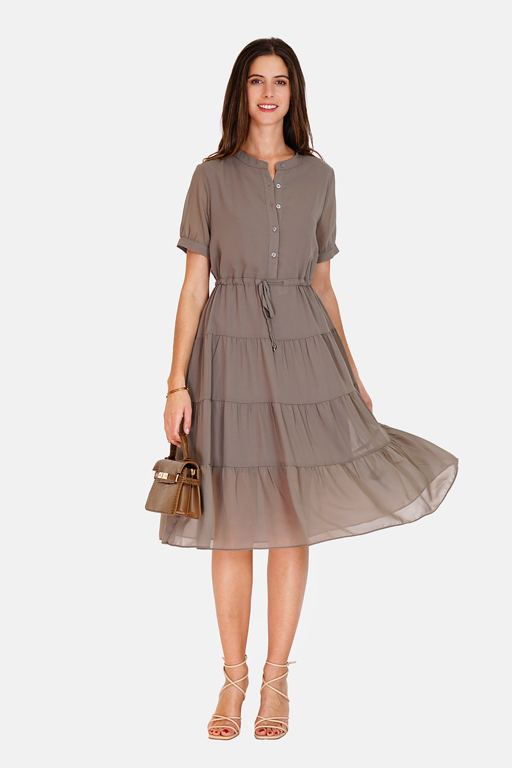 Long dress with peter pan collar, buttoned front, ruffles and short sleeves