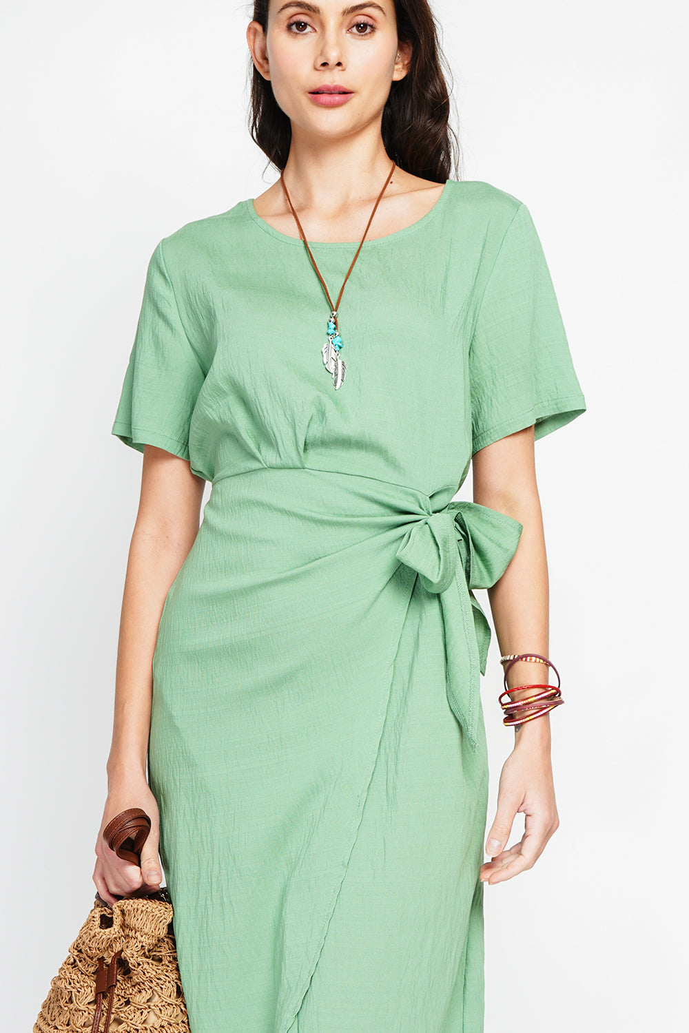 Long dress with knot front and zip closure at the back with short sleeves