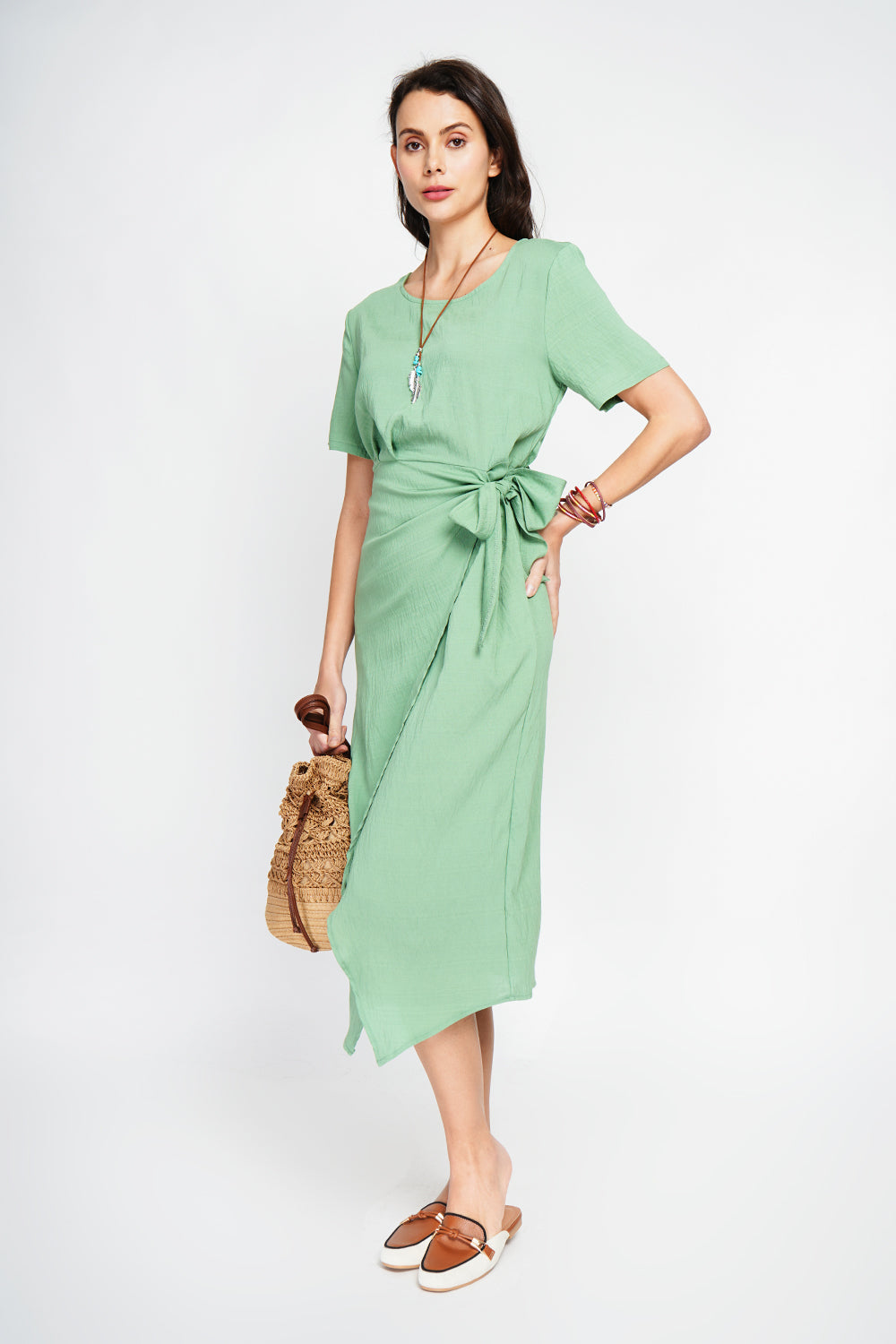 Long dress with knot front and zip closure at the back with short sleeves