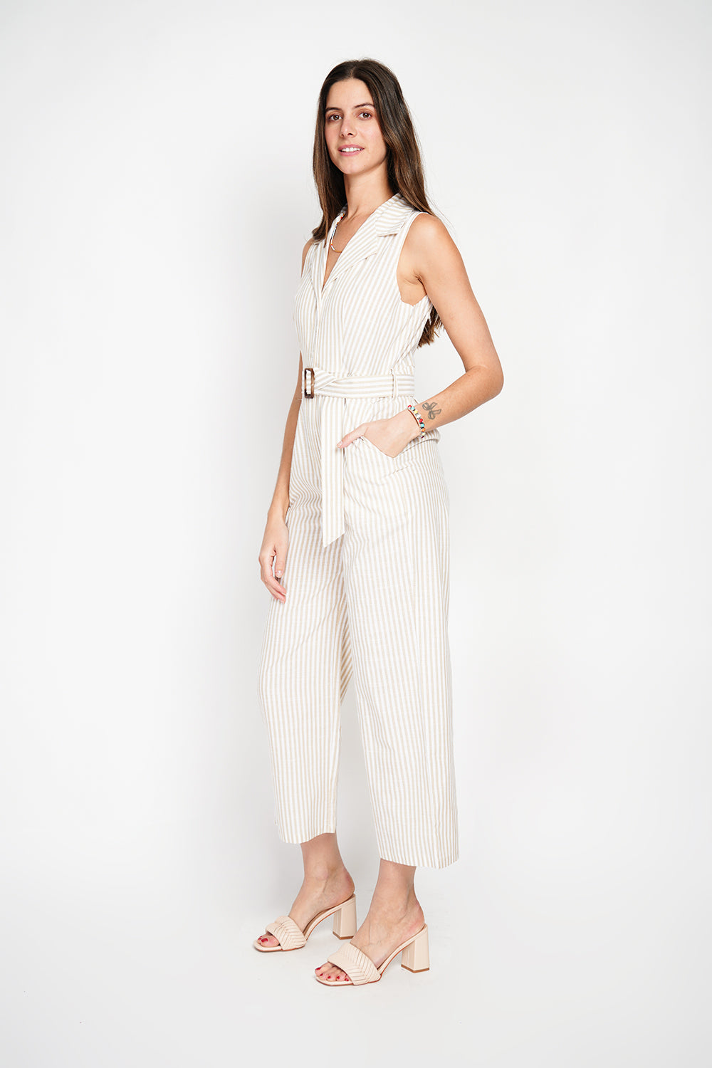 Striped jumpsuit with vintage buckle belt and side pocket