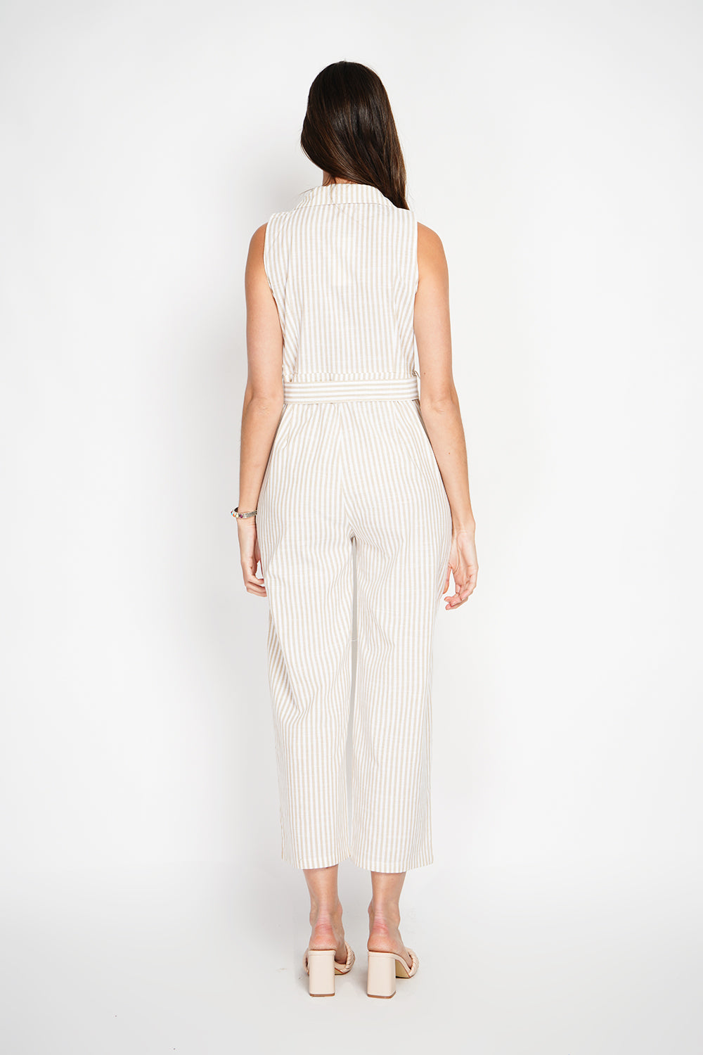 Striped jumpsuit with vintage buckle belt and side pocket