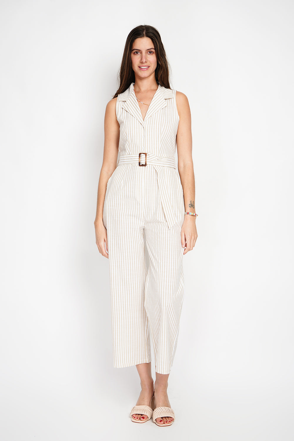 Striped jumpsuit with vintage buckle belt and side pocket