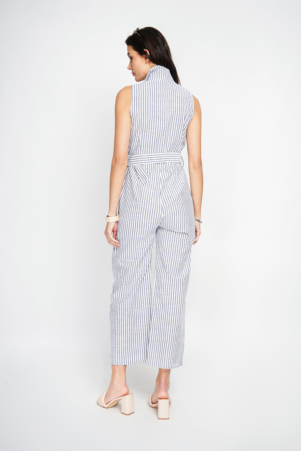 Striped jumpsuit with vintage buckle belt and side pocket