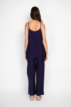 Front buttoned overalls with belt and side pockets