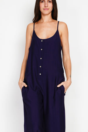 Front buttoned overalls with belt and side pockets