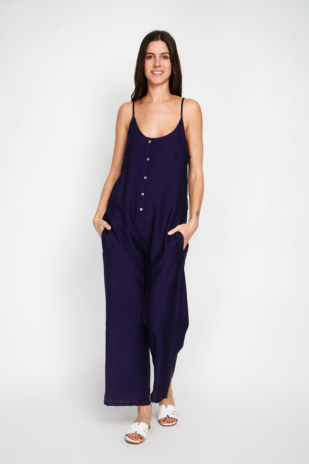 Front buttoned overalls with belt and side pockets