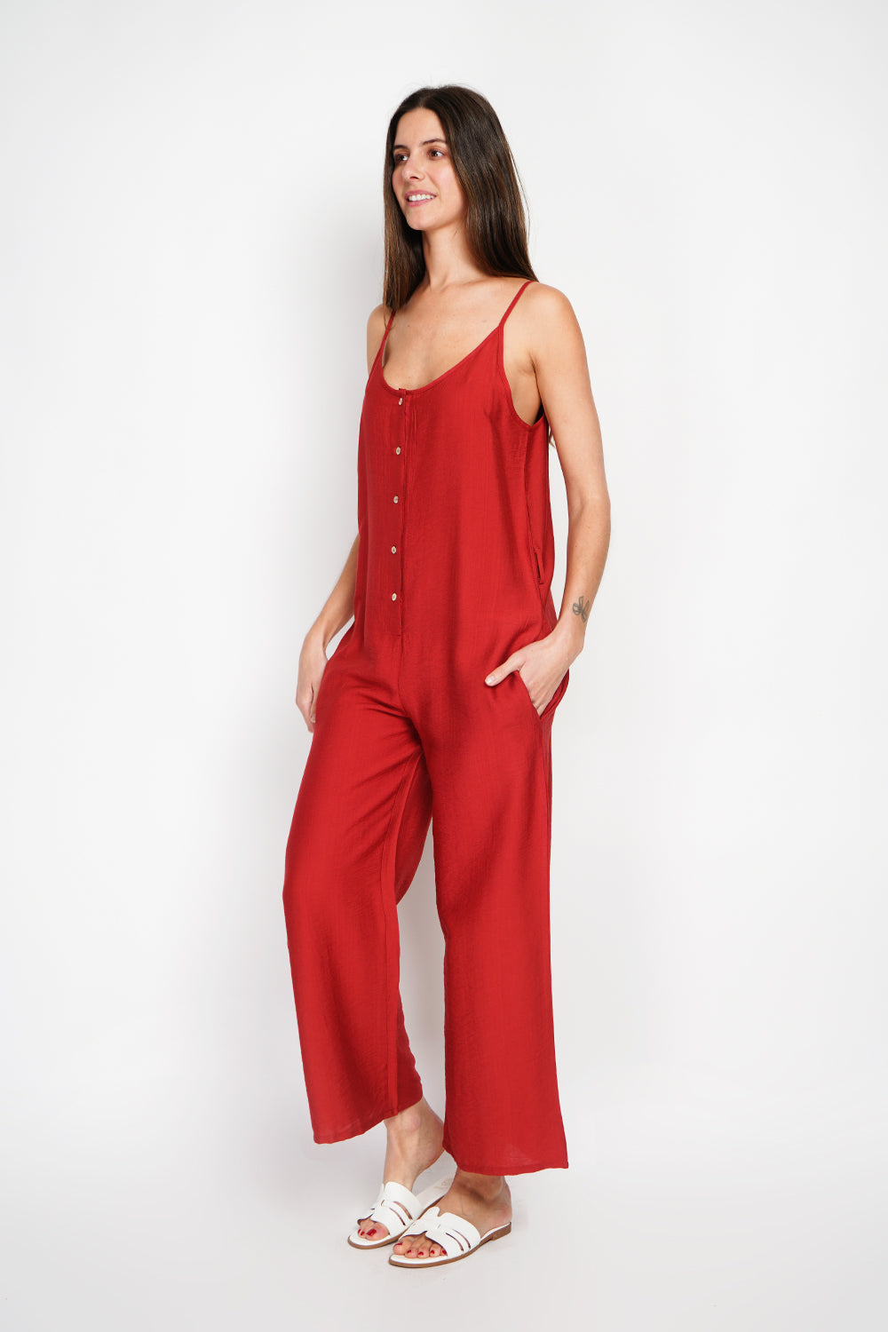 Front buttoned overalls with belt and side pockets