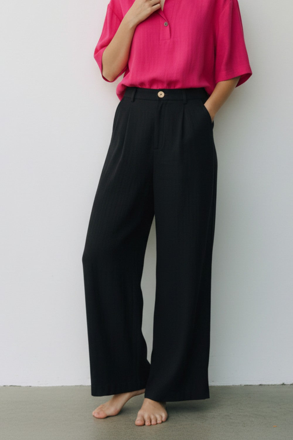 Pantalon coupe large poches latérales – Noir – Assuili