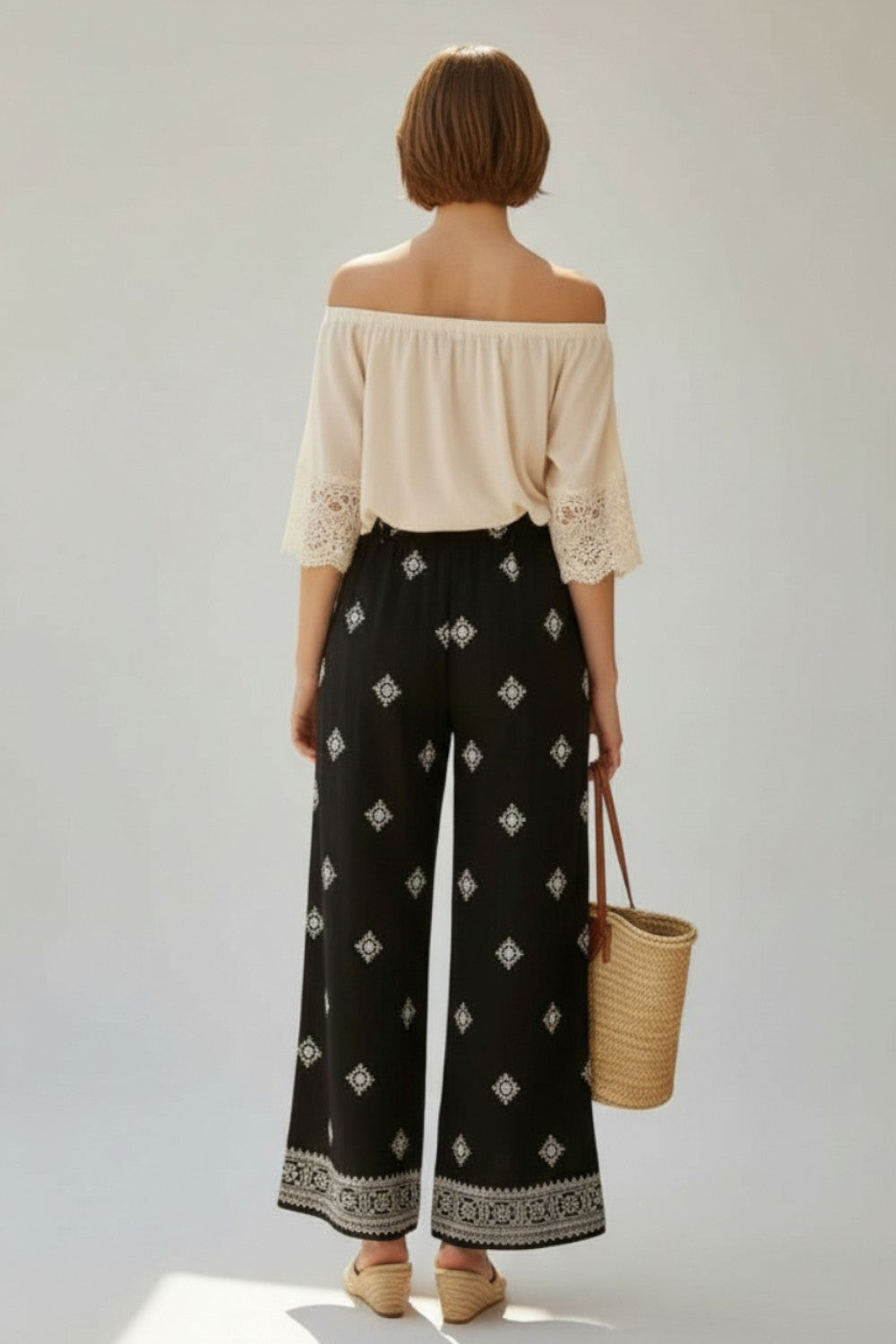 Pantalon large imprimé dos élastiqué – Noir – Assuili