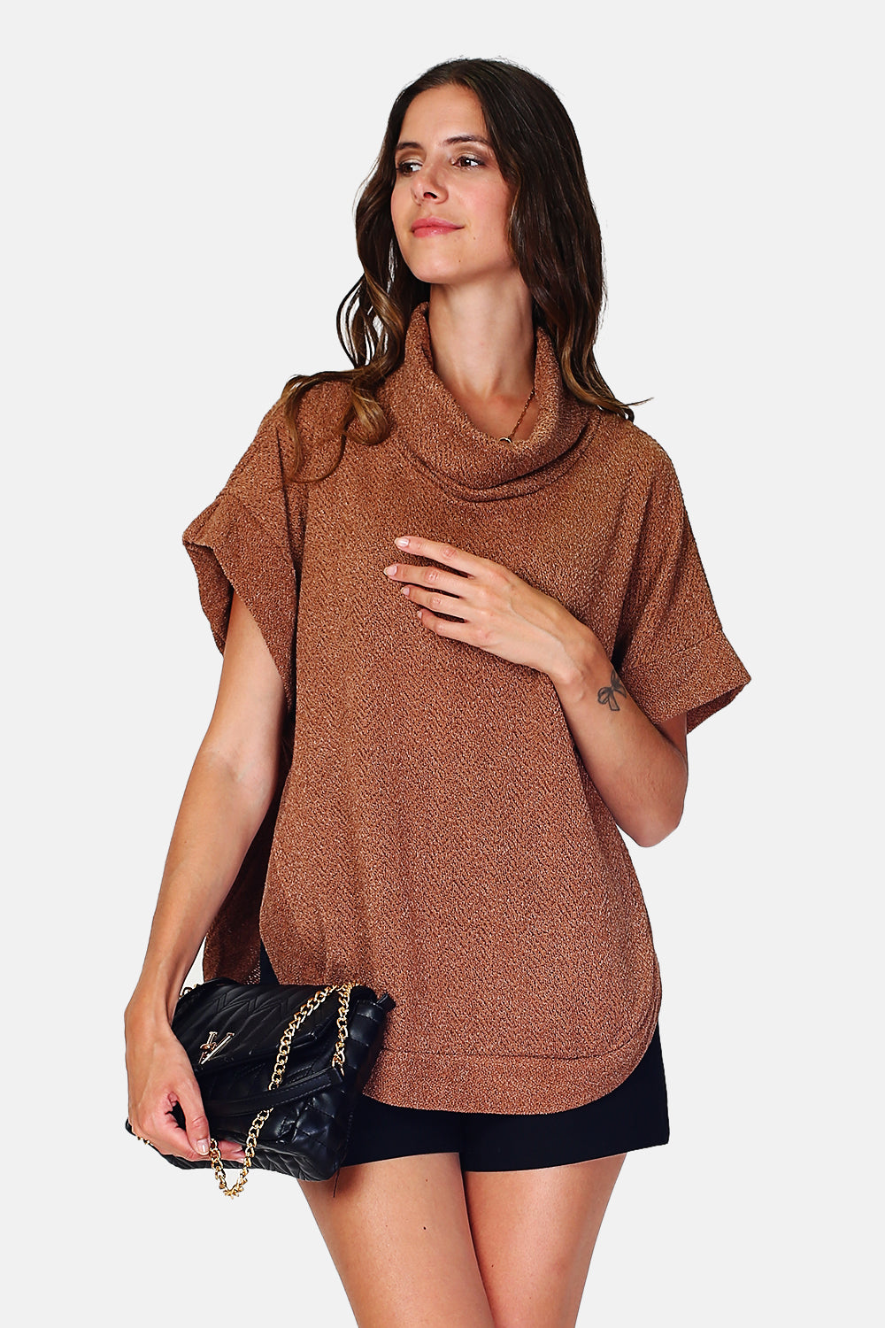 Turtleneck tunic in poncho buttoning on the sides