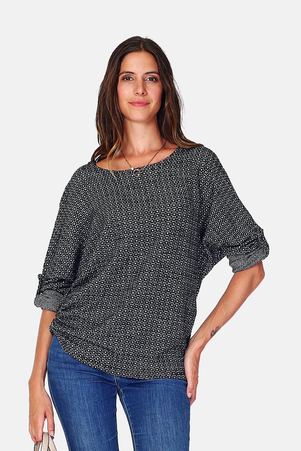 Asymmetrical crew neck sweater with batwing sleeves