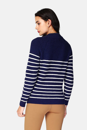 Sailor sweater with high neck closed by a shoulder button placket, pearl rib knitting