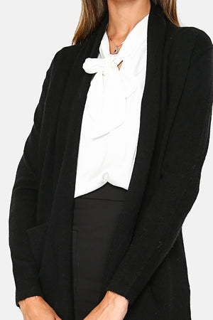 Long shawl collar cardigan with front pockets and long sleeves