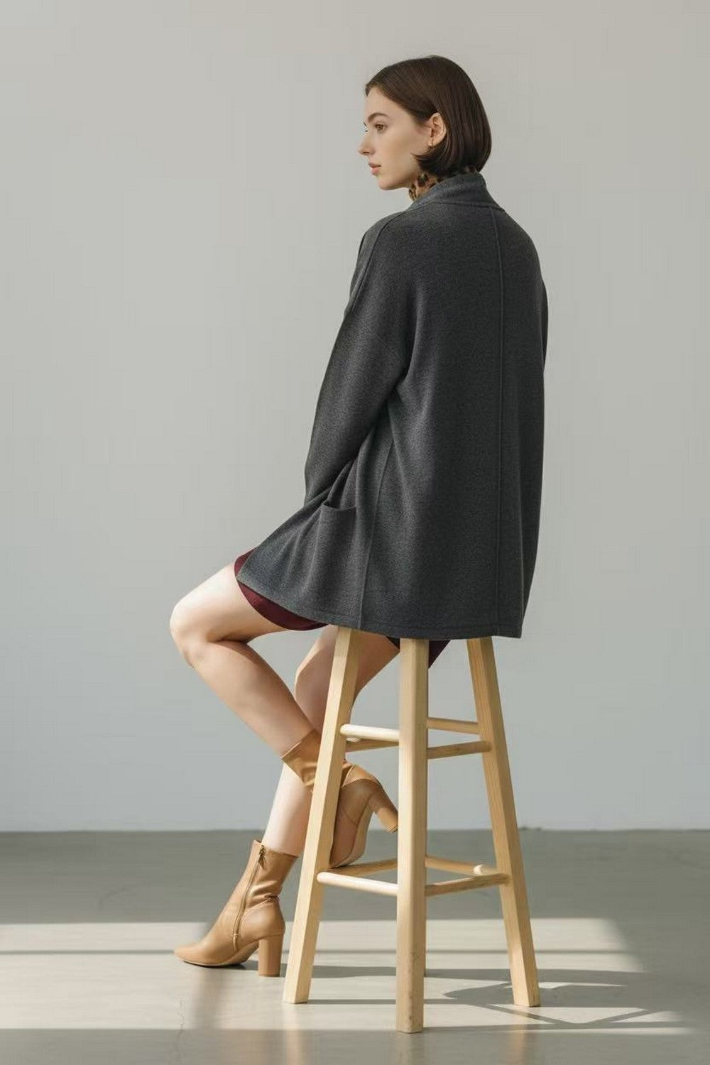 Long shawl collar cardigan with front pockets and long sleeves