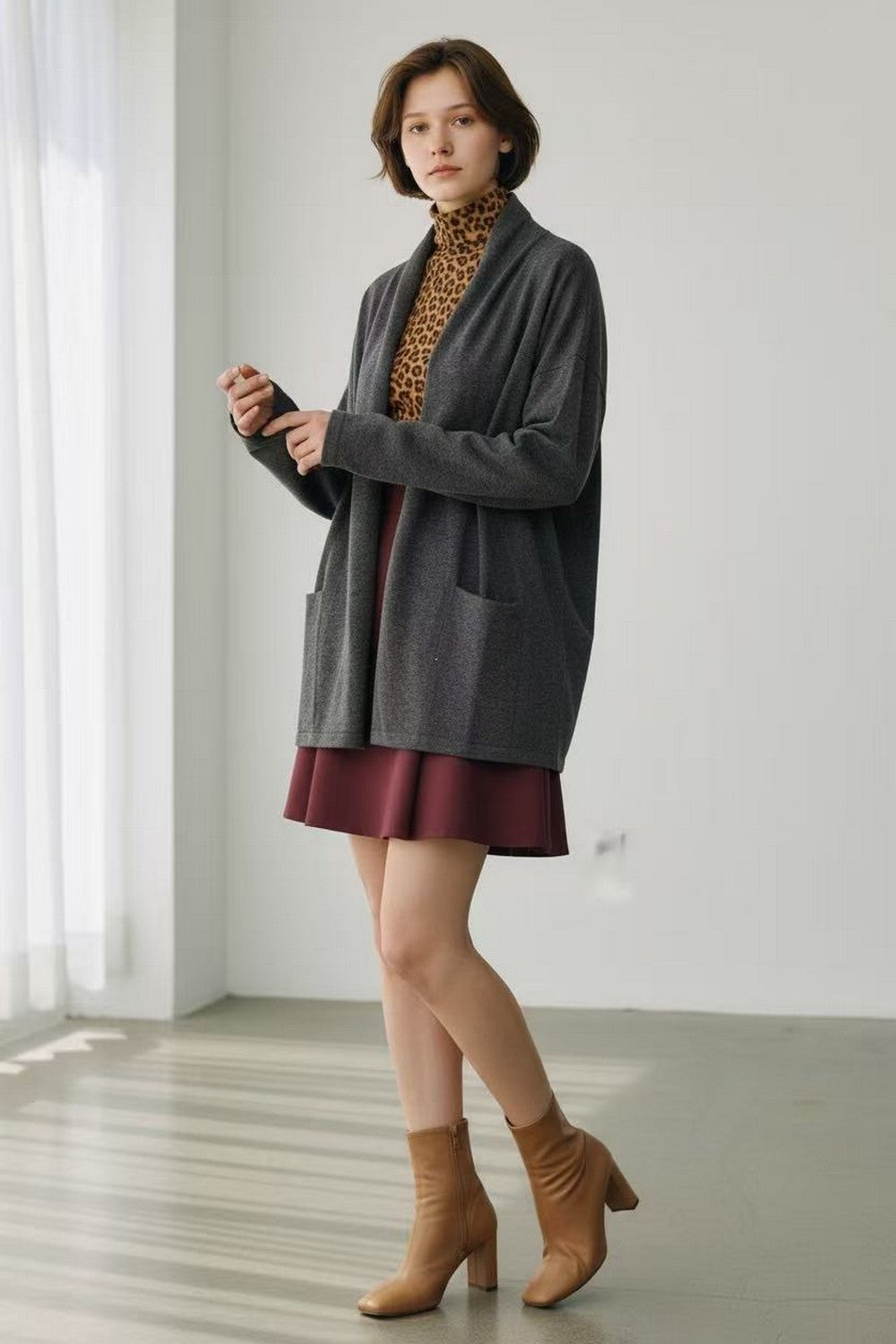 Long shawl collar cardigan with front pockets and long sleeves