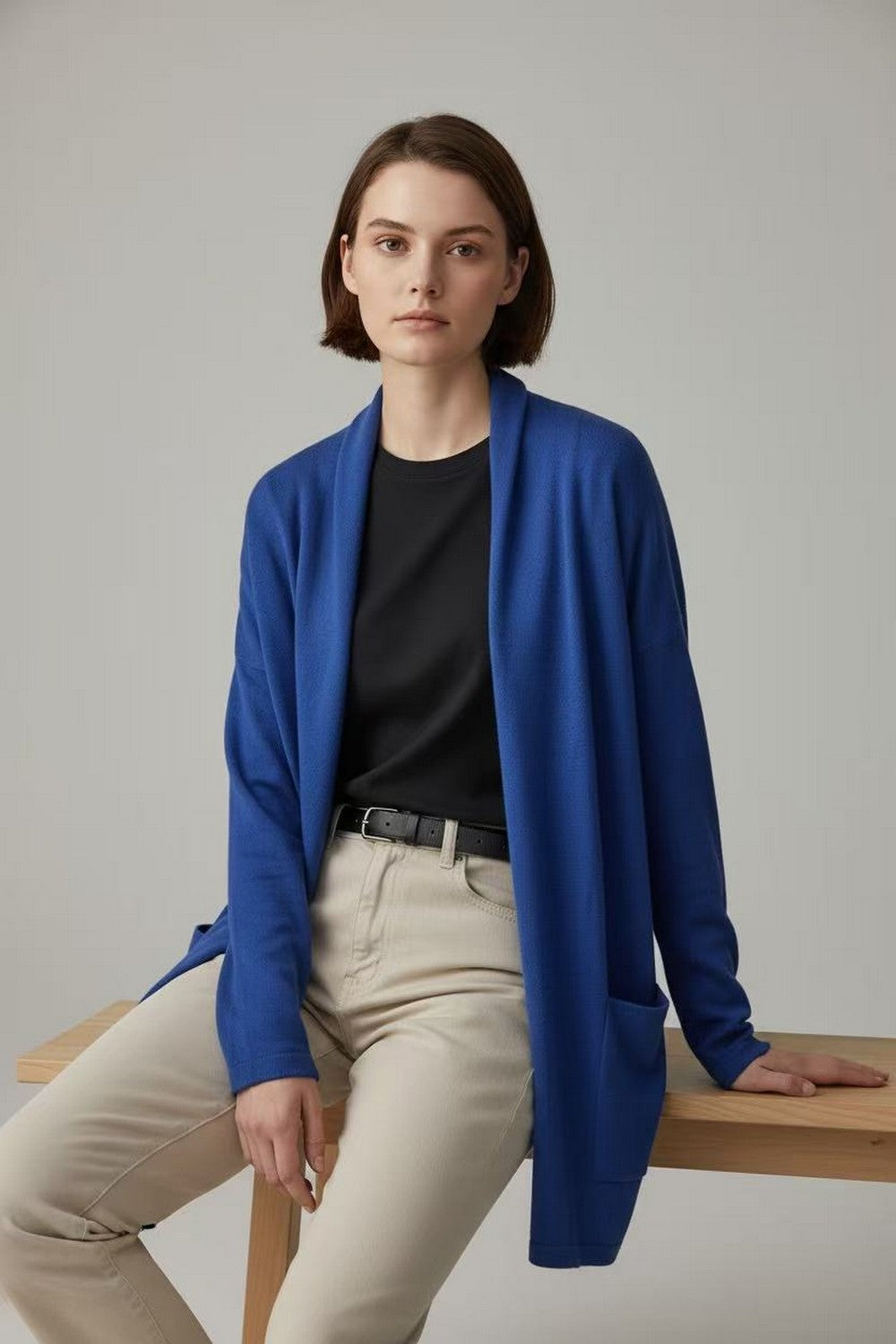 Long shawl collar cardigan with front pockets and long sleeves