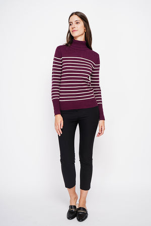 Striped turtleneck sweater with buttoning on the sleeves, length