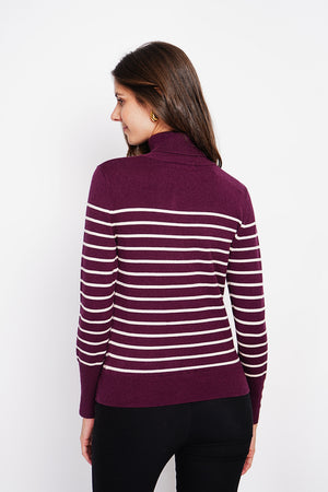 Striped turtleneck sweater with buttoning on the sleeves, length