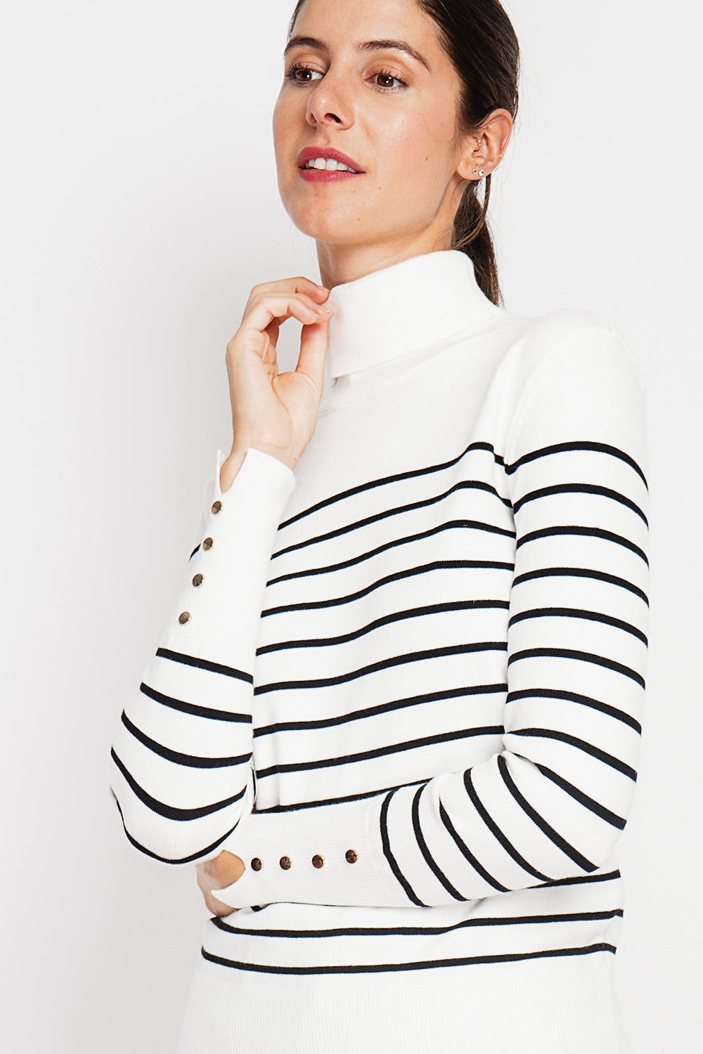 Striped turtleneck sweater with buttoning on the sleeves, length