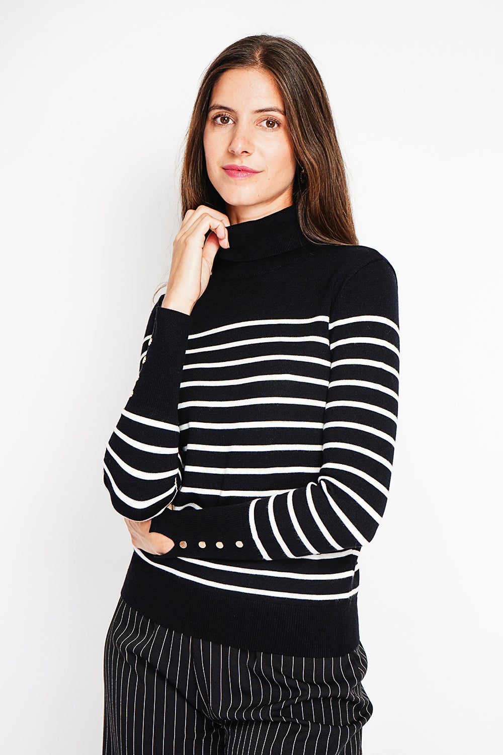 Striped turtleneck sweater with buttoning on the sleeves, length