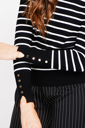Striped turtleneck sweater with buttoning on the sleeves, length