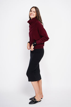Nervous ball neck sweater with batwing sleeves
