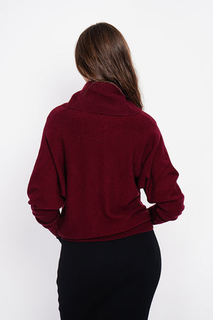 Nervous ball neck sweater with batwing sleeves