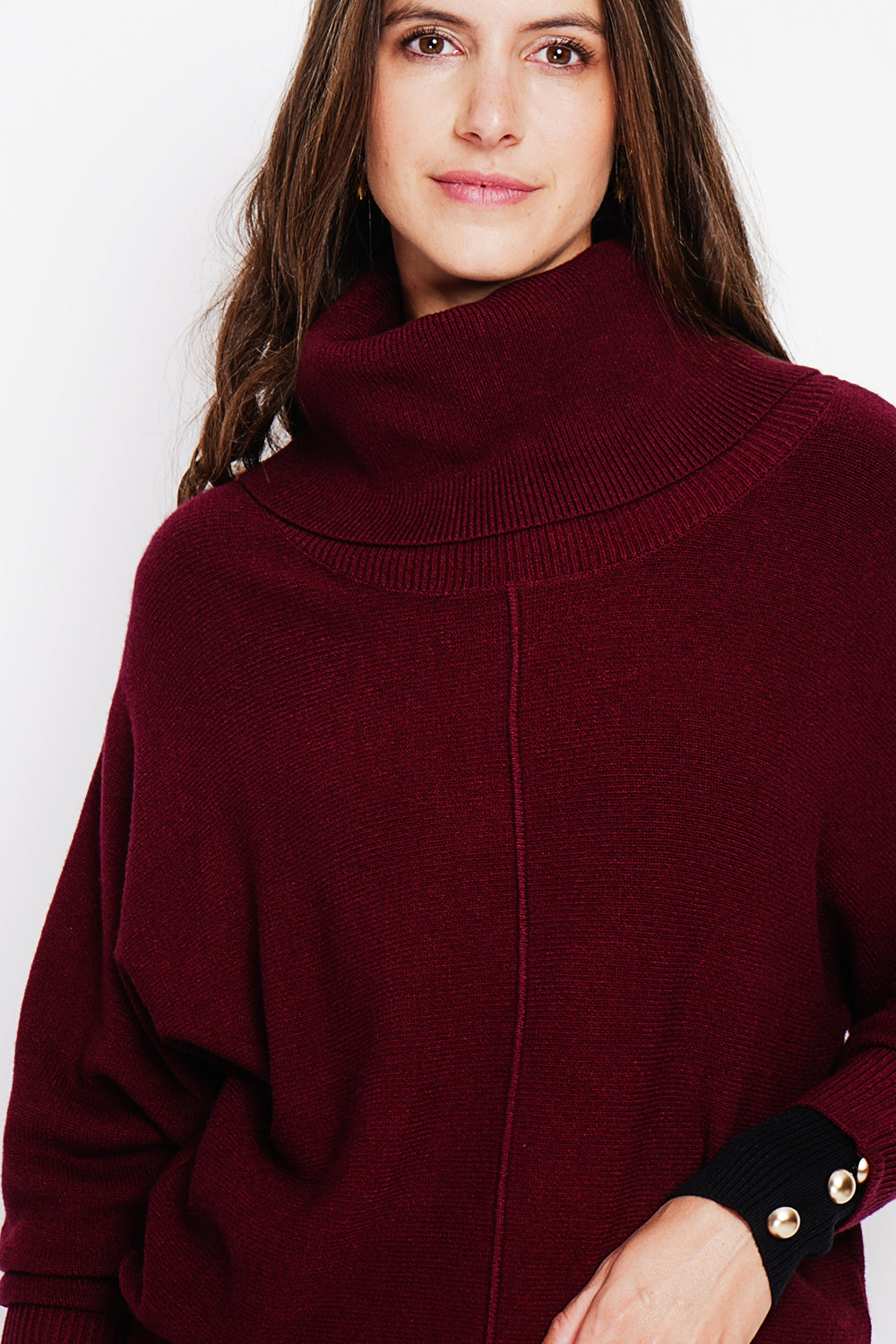 Nervous ball neck sweater with batwing sleeves