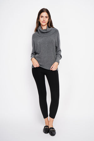Nervous ball neck sweater with batwing sleeves