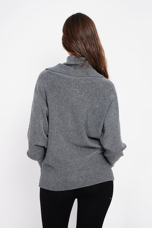 Nervous ball neck sweater with batwing sleeves