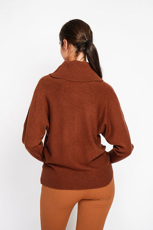 Nervous ball neck sweater with batwing sleeves