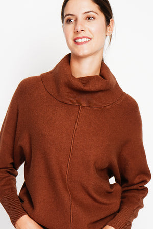 Nervous ball neck sweater with batwing sleeves