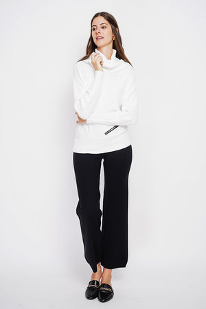 Nervous ball neck sweater with batwing sleeves