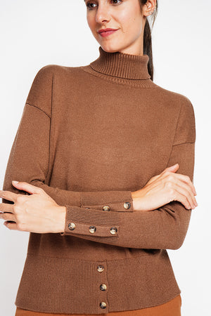 Turtleneck sweater with low front buttoned and long sleeves
