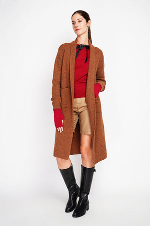 Long fancy knit vest with front pockets and long sleeves