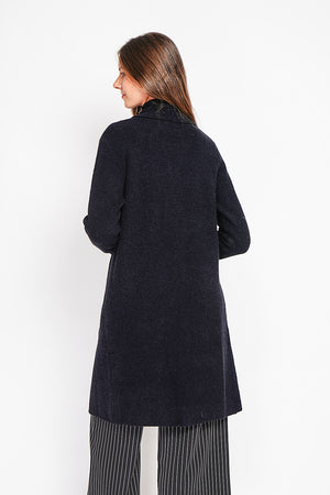 Long fancy knit vest with front pockets and long sleeves