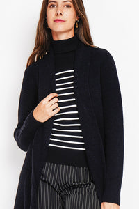 Long fancy knit vest with front pockets and long sleeves