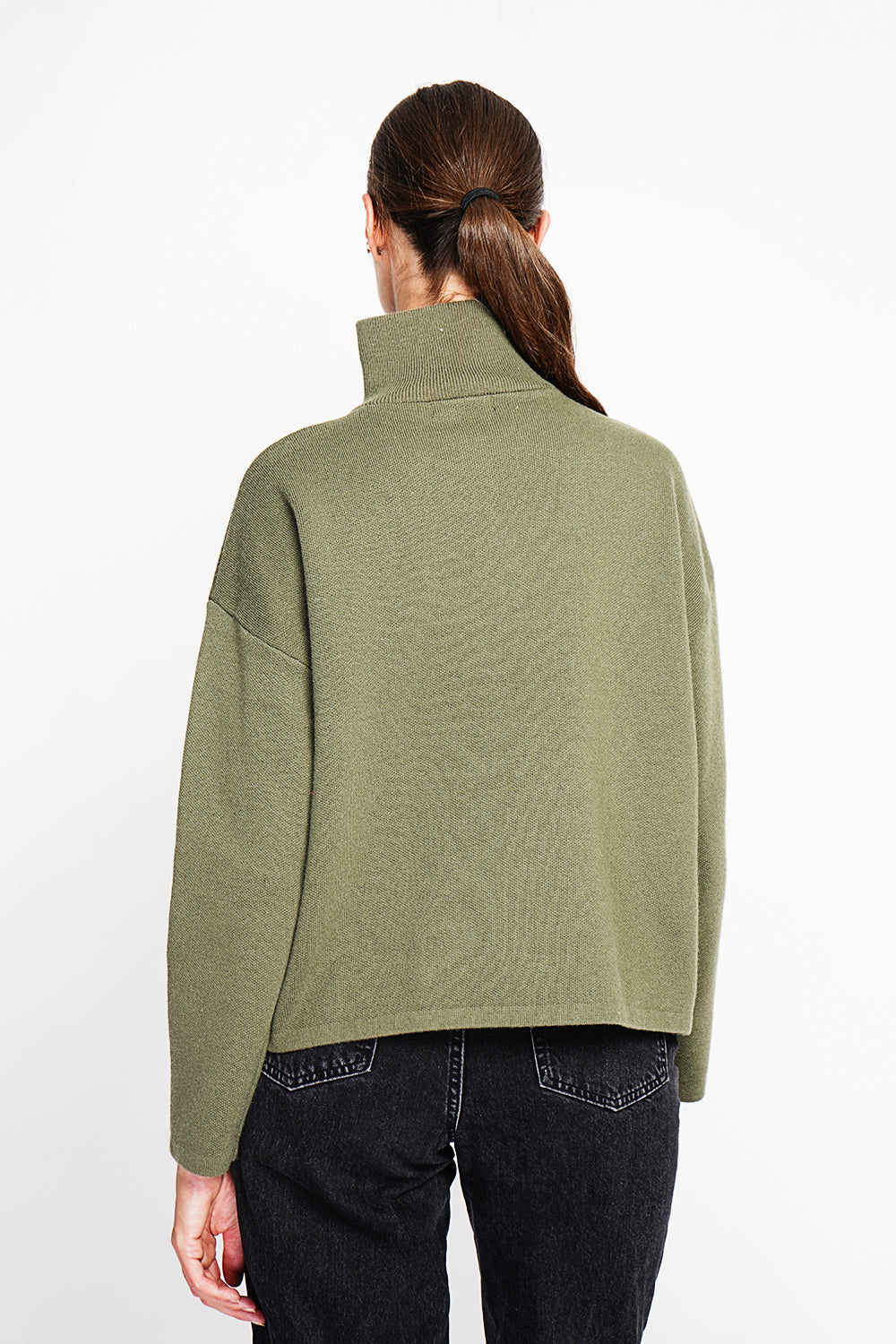 High neck sweater with oversized zip front pocket and long sleeves