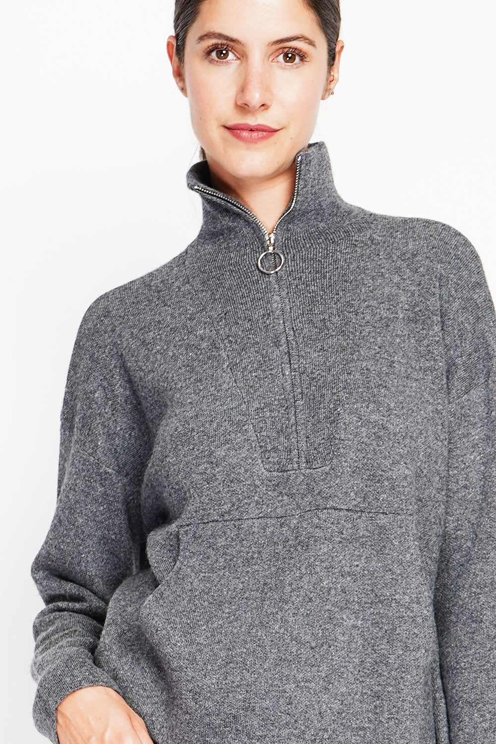 High neck sweater with oversized zip front pocket and long sleeves